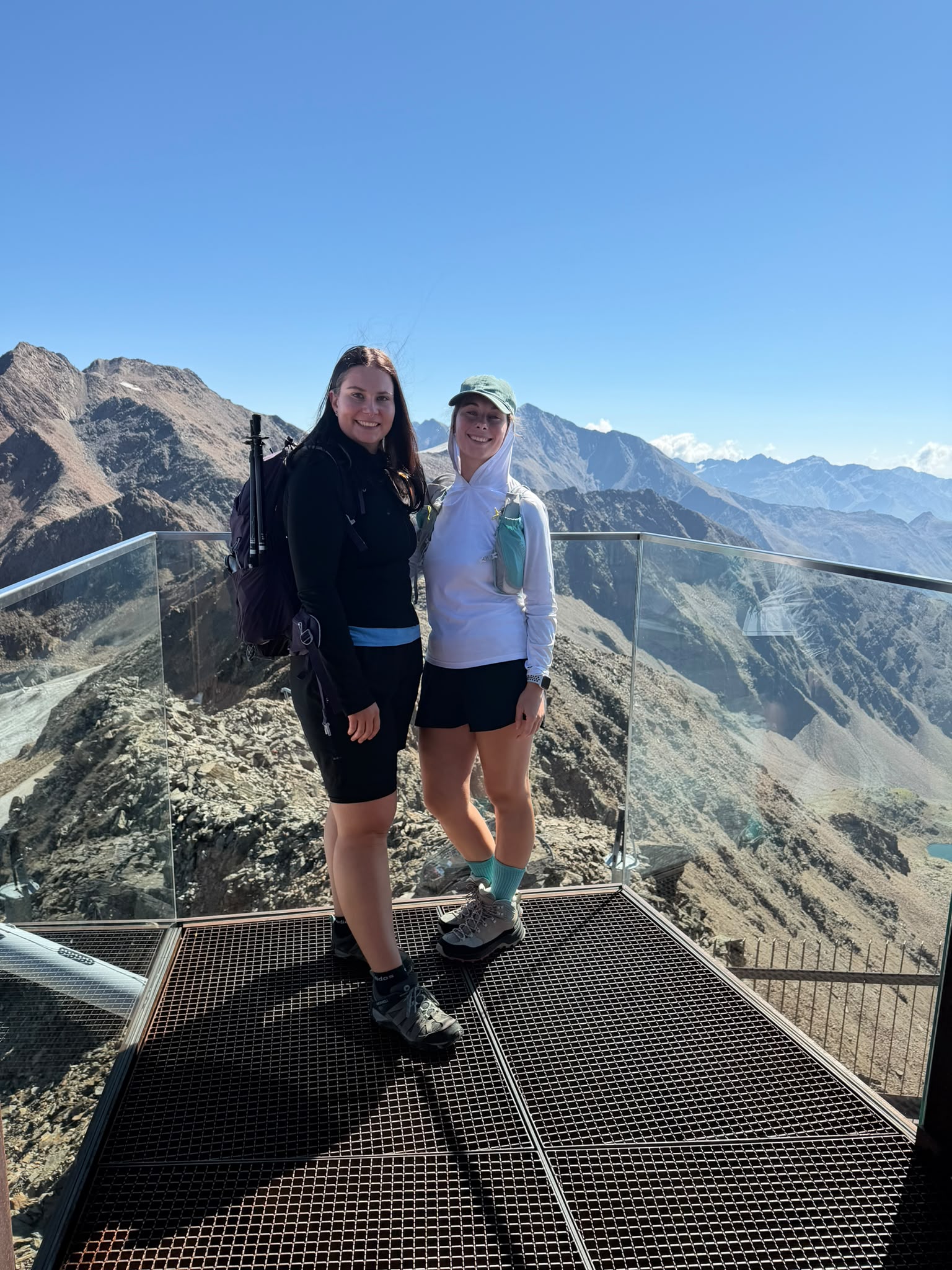 Viola and Juliette on a mountain viewpoint